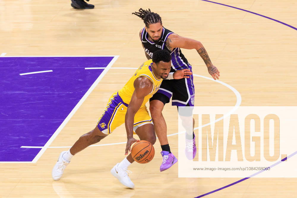Bronny James 9 of the Los Angeles Lakers tries to drive past Emanuel Sharp 34 of the Sacramento Kings during a preseason NBA, Basketball Herren, USA game on Thursday October 8, 2026 at Crypto.com Arena in Los Angeles, California. JAVIER ROJAS PI Lakers Vs. Kings - ZUMAp124 20261008_zaa_p124_009