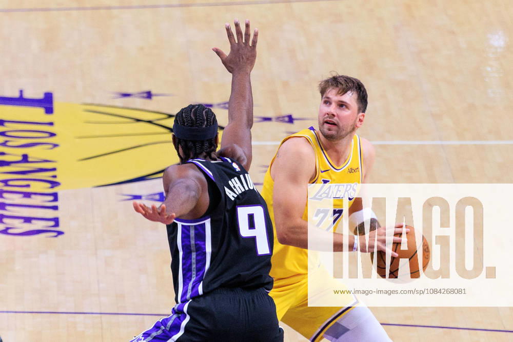 Luka Doncic 77 of the Los Angeles Lakers looks to put up a shot over Precious Achiuwa 9 of the Sacramento Kings during a preseason NBA, Basketball Herren, USA game on Thursday October 8, 2026 at Crypto.com Arena in Los Angeles, California. JAVIER ROJAS PI Lakers Vs. Kings - ZUMAp124 20261008_zaa_p124_017