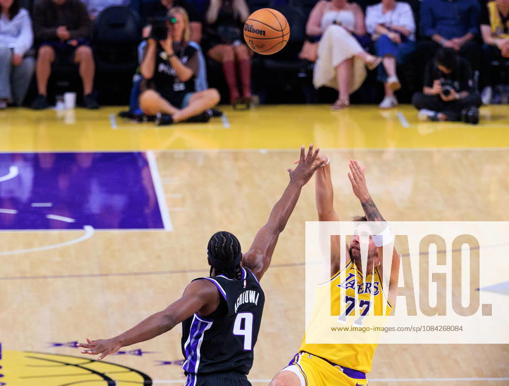 Luka Doncic 77 of the Los Angeles Lakers puts up a shot over Precious Achiuwa 9 of the Sacramento Kings during a preseason NBA, Basketball Herren, USA game on Thursday October 8, 2026 at Crypto.com Arena in Los Angeles, California. JAVIER ROJAS PI Lakers Vs. Kings - ZUMAp124 20261008_zaa_p124_019