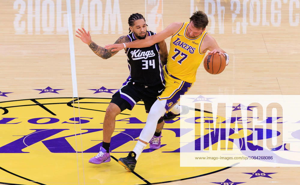 Luka Doncic 77 of the Los Angeles Lakers is fouled by Emanuel Sharp 34 of the Sacramento Kings during a preseason NBA, Basketball Herren, USA game on Thursday October 8, 2026 at Crypto.com Arena in Los Angeles, California. JAVIER ROJAS PI Lakers Vs. Kings - ZUMAp124 20261008_zaa_p124_020
