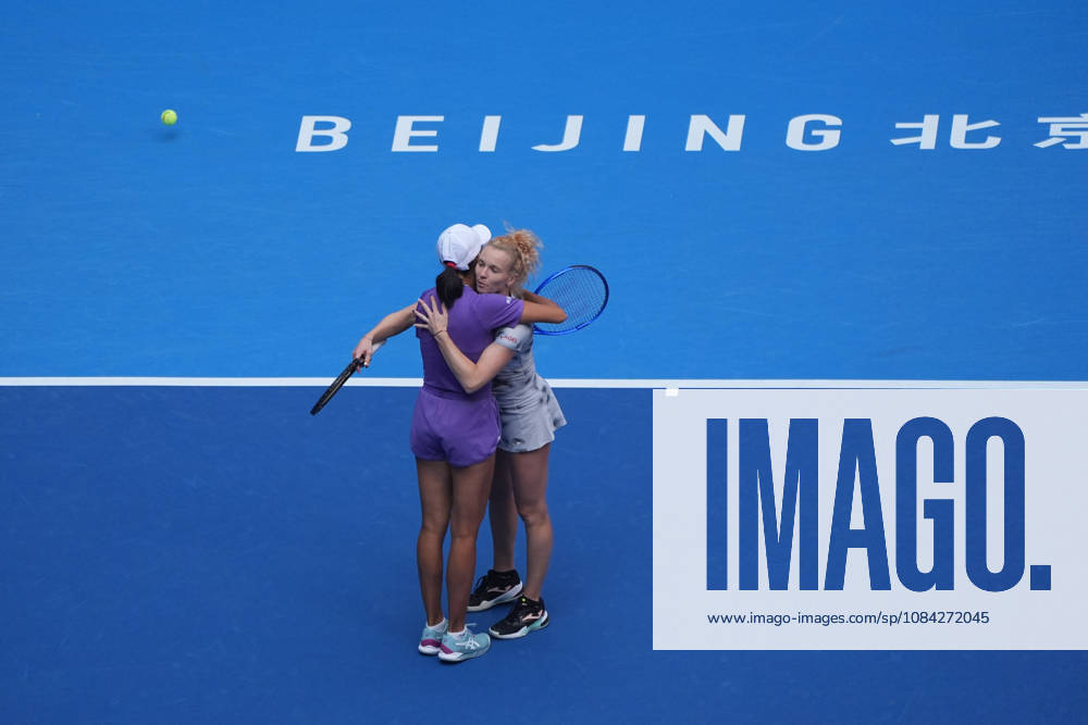 (261009) -- BEIJING, Oct. 9, 2026 -- Katerina Siniakova (R) Zhang Shuai celebrate after winning the women s doubles quarterfinal match between Katerina Siniakova (the Cezch Republic) Zhang Shuai (China) and Storm Hunter (Australia) Kristina Mladenovic (France) at 2026 China Open tennis tournament in Beijing, China, Oct. 9, 2026. ) (SP)CHINA-BEIJING-TENNIS-CHINA OPEN-WOMEN S DOUBLES (CN) XiexHan