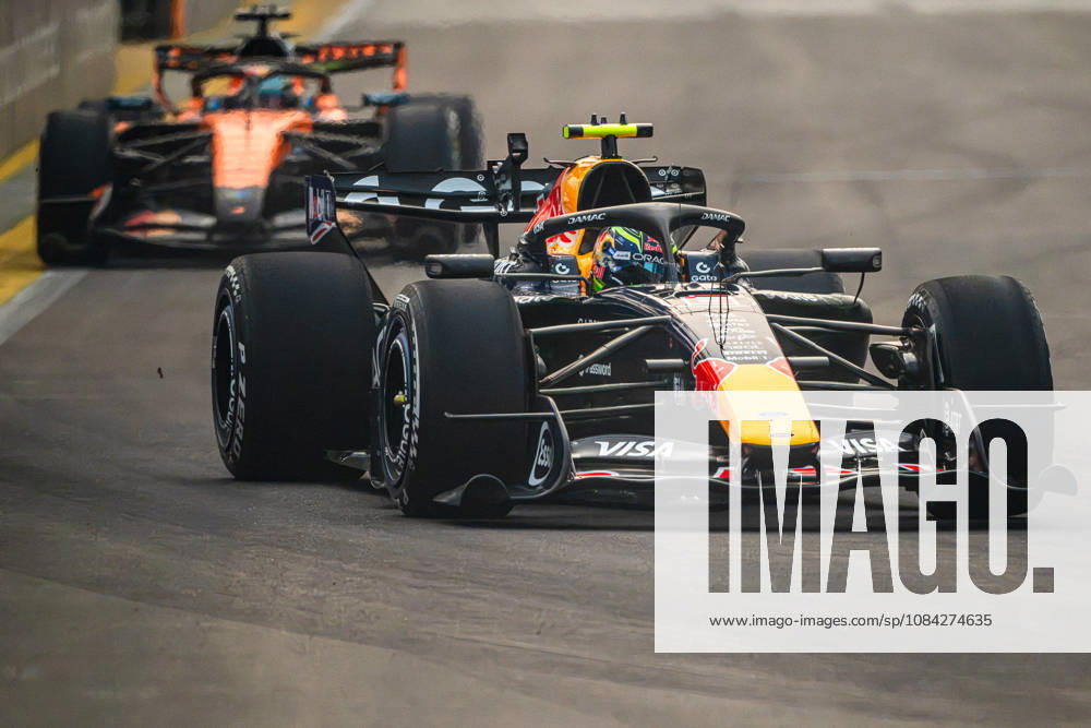 9th October 2026; Marina Bay, Singapore; Formula 1, Singapore Grand Prix, Free Practice and Sprint Qualifying Day; Max Verstappen (3) of the Netherlands and Oracle Red Bull Racing inches ahead of the McLaren Mastercard F1 Team DavidxAsh