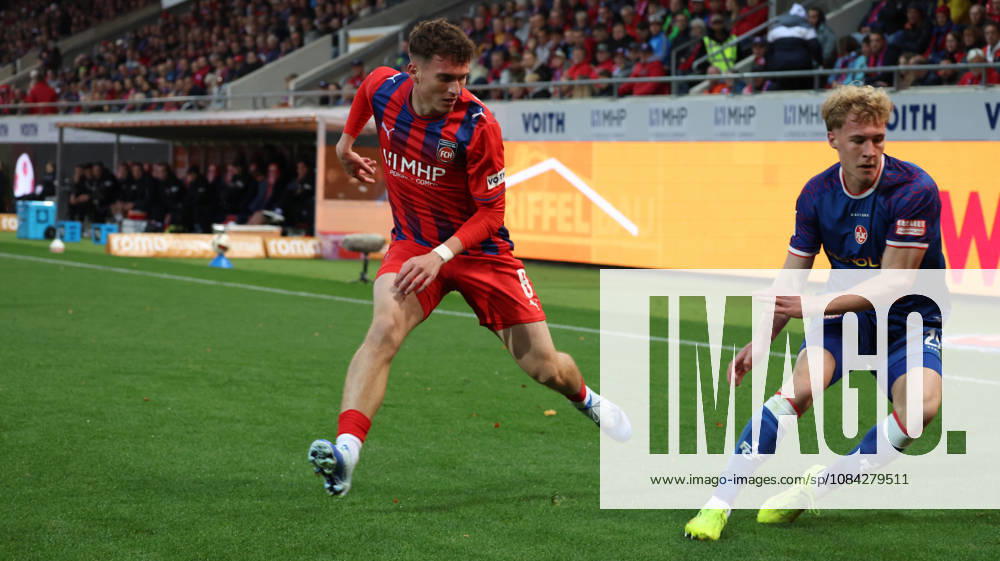 Soccer, 2. Bundesliga, 1 FC Heidenheim vs. 1 FC Kaiserslautern, left: Paul Hennrich (1 FC Heidenheim 1846), Mika Haas (1 FC Kaiserslautern). DFL and DFB regulations prohibit any use of photographs as image sequences and or quasi-video. Heidenheim