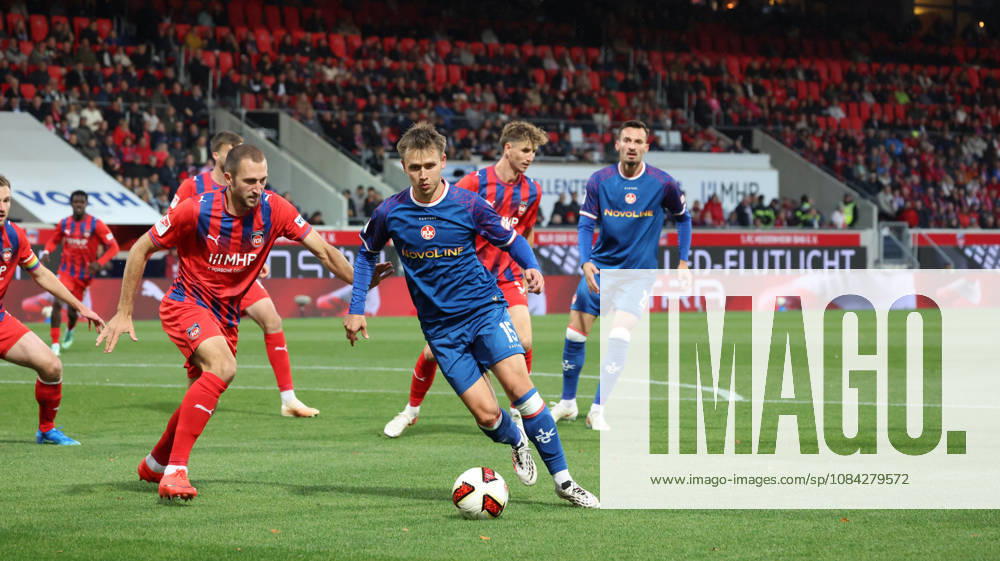Soccer 2. Bundesliga, 1 FC Heidenheim vs. 1 FC Kaiserslautern: l Jonas Föhrenbach (Foehrenbach) 1 FC Heidenheim 1846 Naatan Skyttä (Skyttae) 1 FC Kaiserslautern, tackle, Action, battle for the ball. DFL and DFB regulations prohibit any use of photographs as image sequences and or quasi-video. Heidenheim