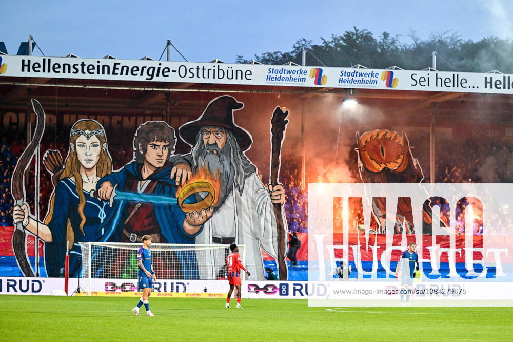 GER, Soccer, Men s, 2. Bundesliga, Matchday 7, 1 FC Heidenheim vs. 1 FC Kaiserslautern; choreography by Heidenheim fans, Ultras, East Stand; motif from *The Lord of the Rings*; pyrotechnics at Heidenheim s Voith Arena, Baden-Württemberg, Germany