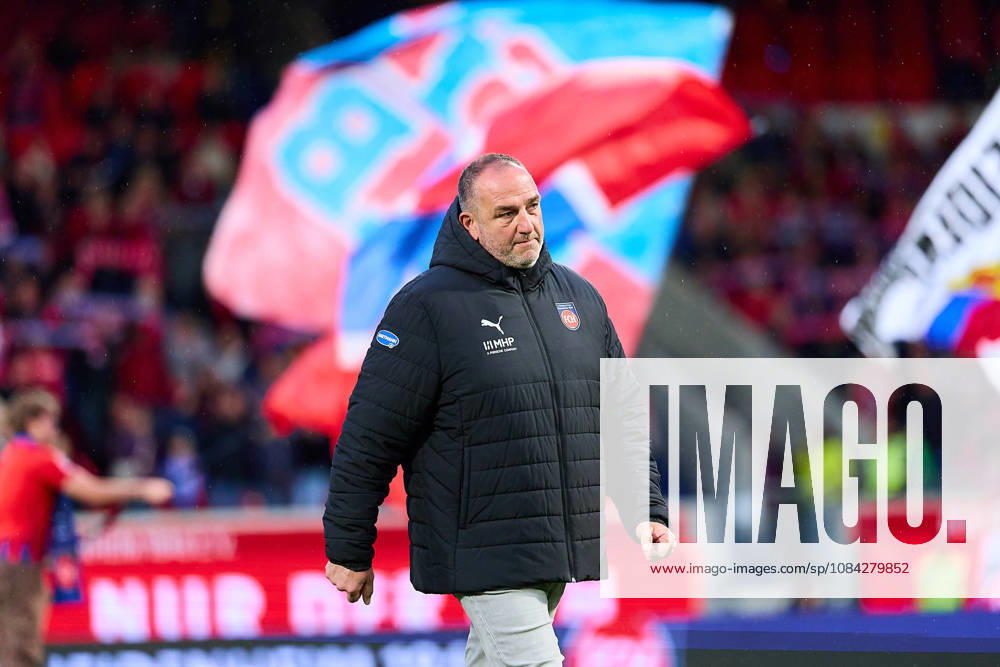 Frank Schmidt, head coach of 1 FC Heidenheim, standing in front of a 1 FC Heidenheim flag (GER), 1 FC Heidenheim 1846 vs. 1 FC Kaiserslautern, soccer, 2. Bundesliga, Matchday 7, 2026–2027 season, October 9, 2026 DFL regulations prohibit any use of photographs as image sequences and or quasi-video GER, 1 FC Heidenheim 1846 vs. 1 FC Kaiserslautern, soccer, 2. Bundesliga, Matchday 7, 2026–2027 season, October 9, 2026, Heidenheim an der Brenz