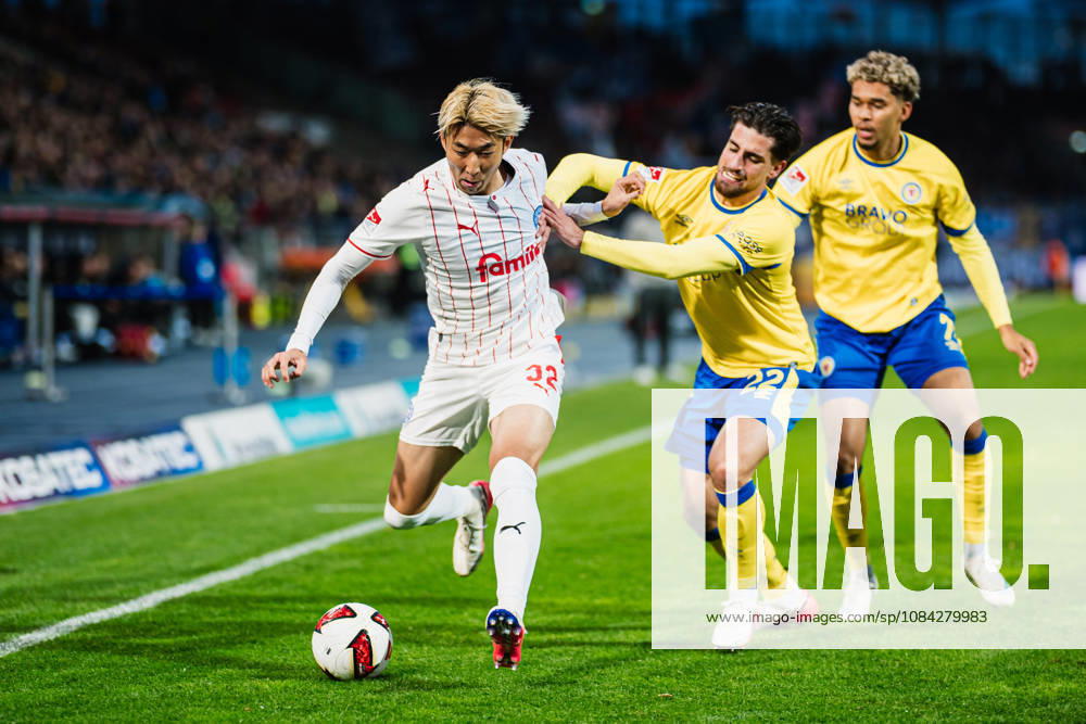 2. Bundesliga: Eintracht Braunschweig vs. Holstein Kiel, October 9, 2026—Hiroki Sekine (Holstein Kiel, 32) vs. Fabio Di Michele Sanchez (Eintracht Braunschweig, 22) in a tackle—soccer, 2. Bundesliga, Matchday 7: Eintracht Braunschweig vs. Holstein Kiel on October 9, 2026, at Eintracht Stadium, Braunschweig. DFL regulations prohibit any use of photographs as image sequences and or quasi-video.
