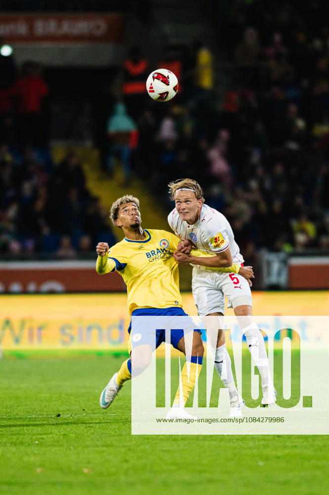 2. Bundesliga: Eintracht Braunschweig vs. Holstein Kiel, October 9, 2026—Yann Sturm (Eintracht Braunschweig, No. 7) vs. Noah Madsen (Holstein Kiel, No. 5) in a one-on-one duel—soccer, 2. Bundesliga, Matchday 7: Eintracht Braunschweig vs. Holstein Kiel on October 9, 2026, at Eintracht Stadium, Braunschweig. DFL regulations prohibit any use of photographs as image sequences and or quasi-video.