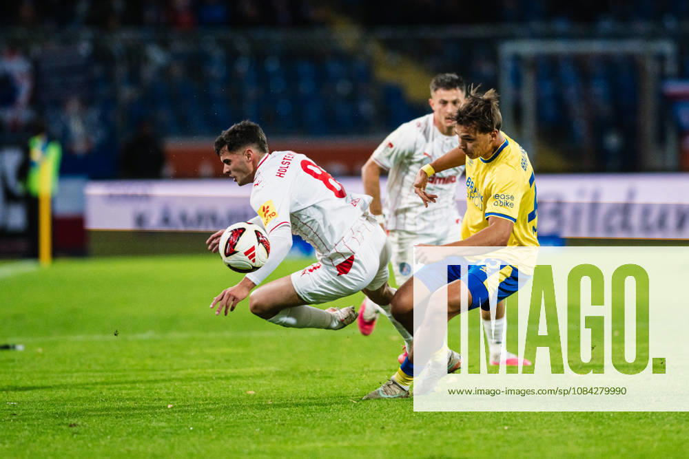 2. Bundesliga: Eintracht Braunschweig vs. Holstein Kiel, October 9, 2026—Guillermo Balzi (Holstein Kiel, No. 8) vs. Max Marie (Eintracht Braunschweig, No. 15) in a tackle during a soccer match, 2. Bundesliga, Matchday 7: Eintracht Braunschweig vs. Holstein Kiel on October 9, 2026, at Eintracht Stadium, Braunschweig. DFL regulations prohibit any use of photographs as image sequences and or quasi-video.