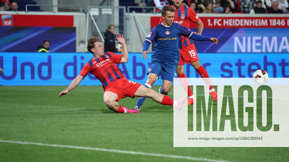 Soccer 2. Bundesliga, 1. FC Heidenheim vs. 1. FC Kaiserslautern, by Michael Heule, 1. FC Heidenheim 1846, Naatan Skyttä Skyttae, 1. FC Kaiserslautern, tackle, Action, battle for the ball. DFL and DFB regulations prohibit any use of photographs as image sequences and or quasi-video. Heidenheim