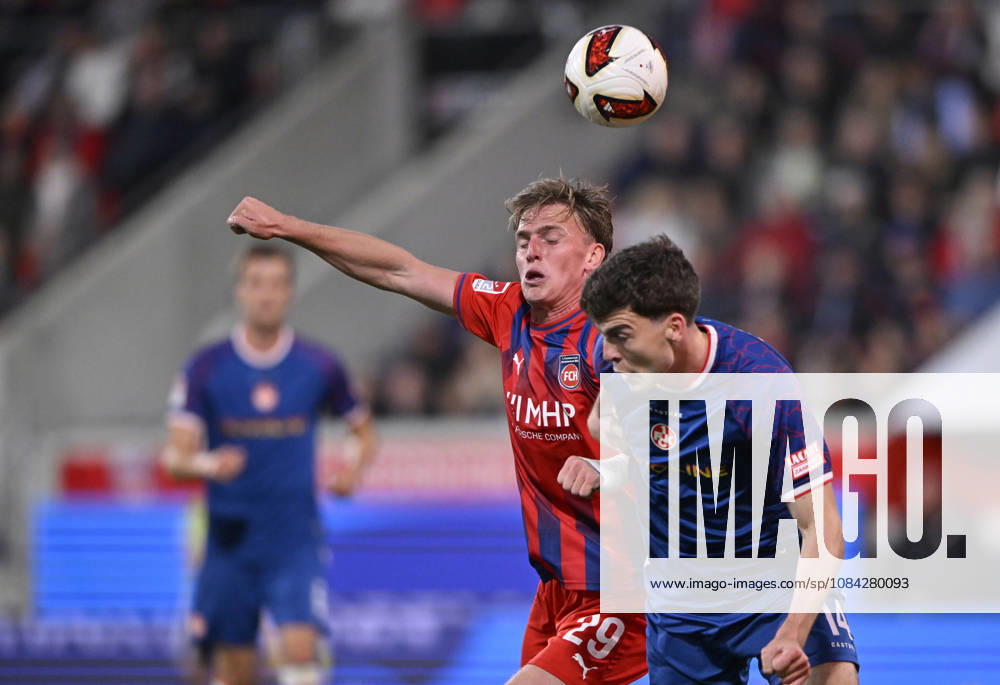 Heading duel, tackle, action: Mikkel Kaufmann (1 FC Heidenheim 1846, FCH 29) vs. Jacob Rasmussen (1 FC Kaiserslautern, FCK 14) 1 FC Heidenheim 1846 FCH vs. 1 FC Kaiserslautern 09 10 2026 DFL regulations prohibit any use of photographs as image sequences and or quasi-video. 1 FC Heidenheim 1846 FCH vs. 1 FC Kaiserslautern
