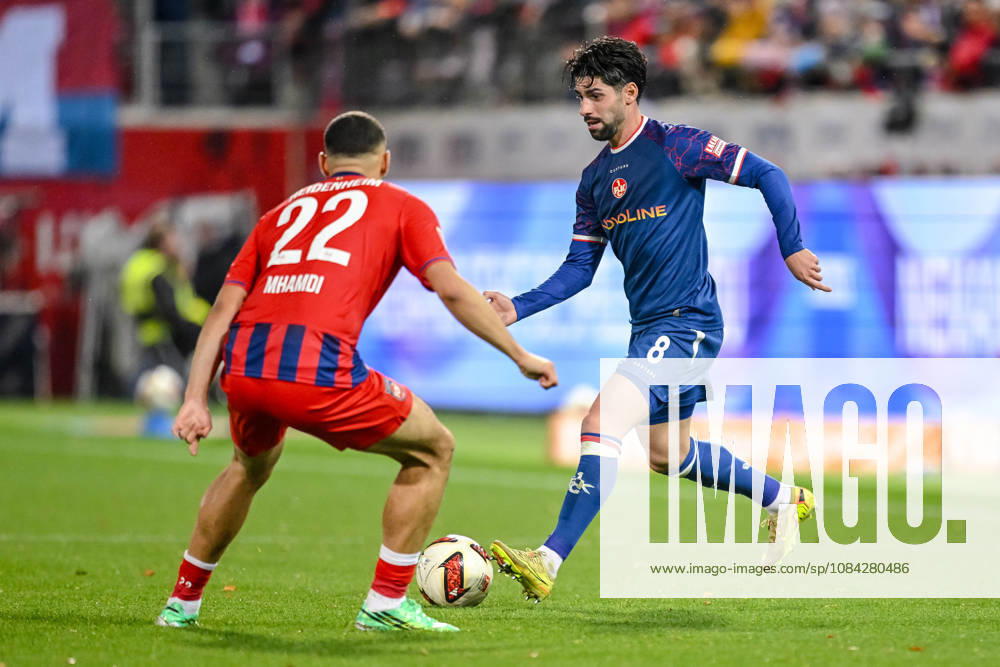 Oualid Mhamdi of 1 FC Heidenheim 1846 and Semih Sahin of 1 FC Kaiserslautern in a tackle during the 2. Bundesliga match between 1 FC Heidenheim and 1 FC Kaiserslautern, at the Voith Arena on October 9, 2026, in Heidenheim an der Brenz, Germany. Photo by Harry Langer, DeFodi Images. Oualid Mhamdi of 1 FC Heidenheim 1846 and Semih Sahin of 1 FC Kaiserslautern battle for the ball during the 2. Bundesliga match between 1 FC Heidenheim and 1 FC Kaiserslautern at Voith Arena on October 9, 2026, in Heidenheim an der Brenz, Germany Photo by Harry Langer DeFodi Images DFB and DFL regulations prohibit any use of photographs as image sequences and or quasi-video Photo by Harry Langer DeFodi Images DFB and DFL regulations prohibit any use of photographs as imSEQUENCES AND OR QUASI-VIDEO