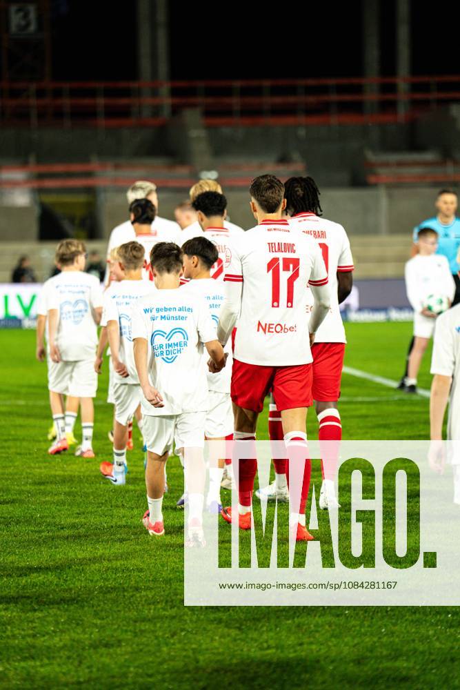 3rd Division, Matchday 8, SC Preußen Münster vs. Rot Weiss Essen at the LVM Preußenstadion; Semir Telalovic from Essen entering the field from behind. IMPORTANT NOTICE: In accordance with DFB and DFL regulations, it is prohibited to use or allow the use of photographs taken in the stadium and or during the game in the form of sequential images and or video-like photo series