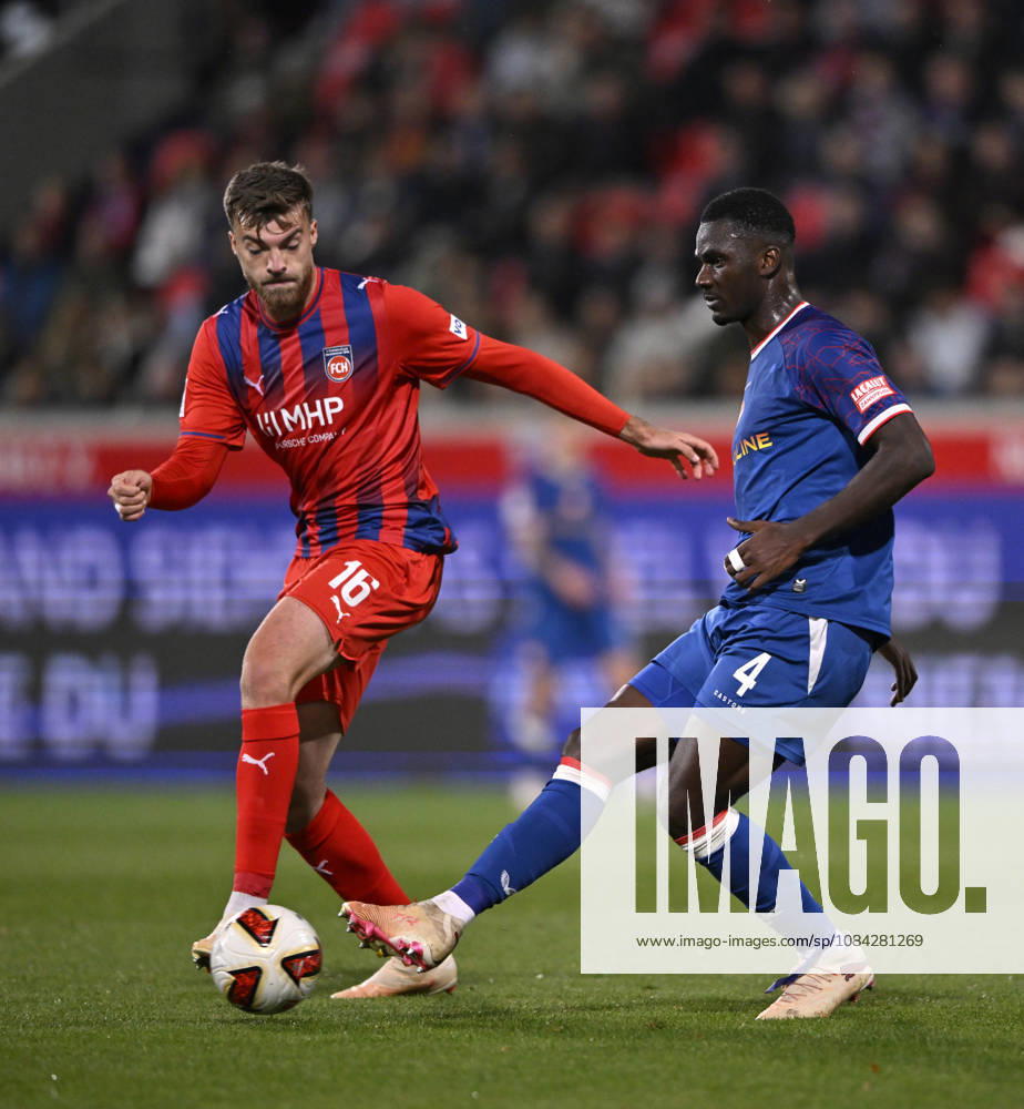 Tackle, Action: Maxwell Gyamfi (1 FC Kaiserslautern FCK 04) vs. Julian Niehues (1 FC Heidenheim 1846 FCH 16) 1 FC Heidenheim 1846 FCH vs. 1 FC Kaiserslautern 09 10 2026 DFL REGULATIONS PROHIBIT ANY USE OF PHOTOGRAPHS AS IMAGE SEQUENCES AND OR QUASI-VIDEO 1 FC Heidenheim 1846 FCH vs. 1 FC Kaiserslautern