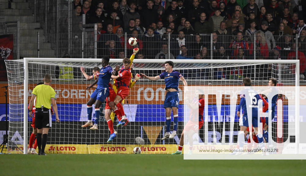 Penalty area play, Goalmouth action: Goalkeeper Thomas Daehne, 1 FC Heidenheim 1846 (FCH) 33; Referee Florian Lechner, Jan Schoeppner, 1 FC Heidenheim 1846 (FCH) 03; Patrick Mainka, 1 FC Heidenheim 1846 (FCH) 06 Maxwell Gyamfi 1 FC Kaiserslautern FCK 04 1 FC Heidenheim 1846 FCH vs. 1 FC Kaiserslautern 09 10 2026 DFL REGULATIONS PROHIBIT ANY USE OF PHOTOGRAPHS AS IMAGE SEQUENCES AND OR QUASI-VIDEO 1 FC Heidenheim 1846 FCH vs. 1 FC Kaiserslautern