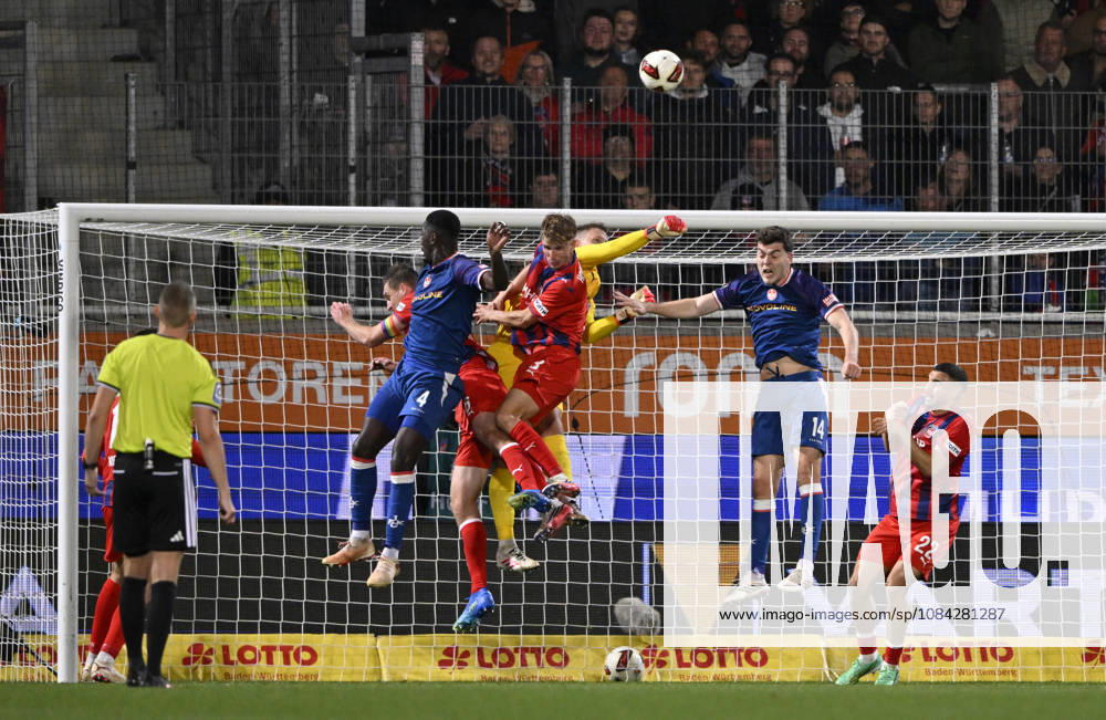 Penalty area play, Goalmouth action: Goalkeeper Thomas Daehne, 1 FC Heidenheim 1846 (FCH) 33; Referee Florian Lechner, Jan Schoeppner, 1 FC Heidenheim 1846 (FCH) 03; Patrick Mainka, 1 FC Heidenheim 1846 (FCH) 06 Maxwell Gyamfi 1 FC Kaiserslautern FCK 04 1 FC Heidenheim 1846 FCH vs. 1 FC Kaiserslautern 09 10 2026 DFL REGULATIONS PROHIBIT ANY USE OF PHOTOGRAPHS AS IMAGE SEQUENCES AND OR QUASI-VIDEO 1 FC Heidenheim 1846 FCH vs. 1 FC Kaiserslautern