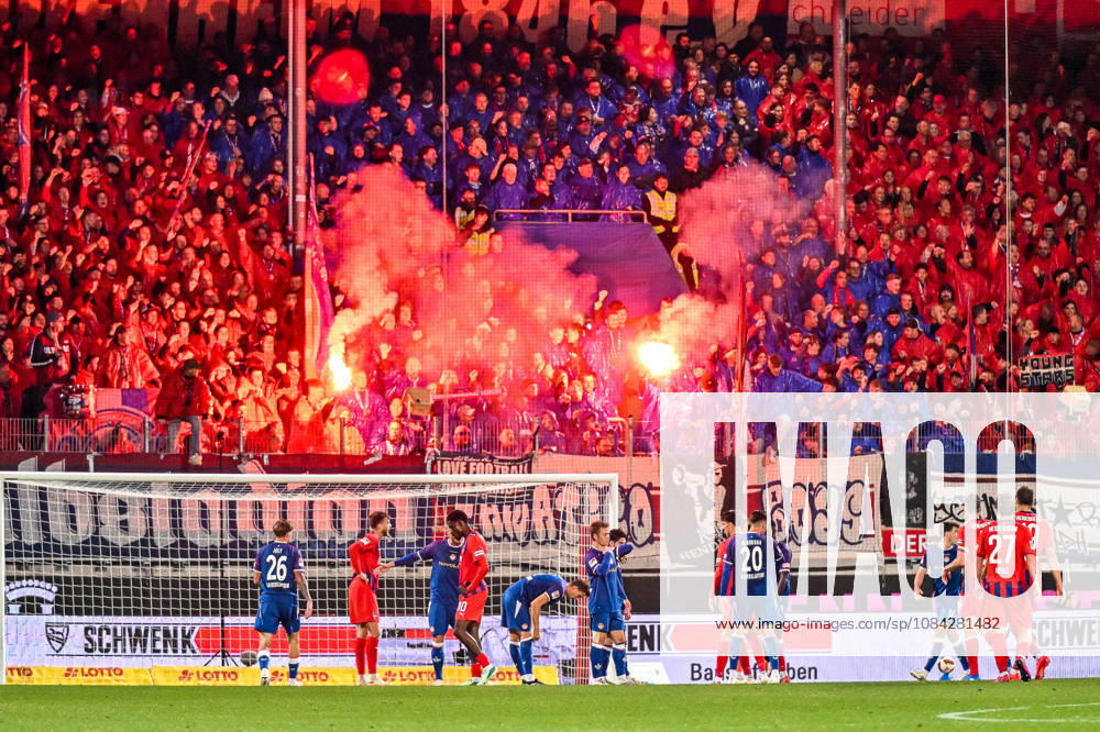 Germany, Soccer, Men s, 2. Bundesliga, Matchday 7, 1. FC Heidenheim vs. 1. FC Kaiserslautern; Pyrotechnics in the Heidenheim fan section, Ultras, fan curve, East Curve, Heidenheim Voith Arena, Baden-Württemberg, Germany