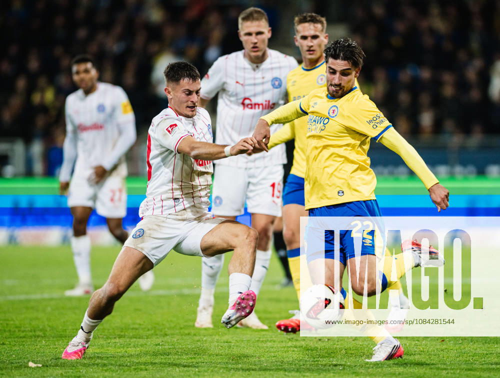 2. Bundesliga: Eintracht Braunschweig vs. Holstein Kiel, October 9, 2026; Adrian Kapralik (Holstein Kiel, No. 20) vs. Fabio Di Michele Sanchez (Eintracht Braunschweig, No. 22); tackle; soccer, 2. Bundesliga, Matchday 7: Eintracht Braunschweig vs. Holstein Kiel on October 9, 2026, at Eintracht Stadium, Braunschweig. DFL regulations prohibit any use of photographs as image sequences and or quasi-video.