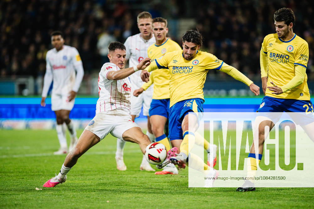 2. Bundesliga: Eintracht Braunschweig vs. Holstein Kiel, October 9, 2026; Adrian Kapralik (Holstein Kiel, No. 20) vs. Fabio Di Michele Sanchez (Eintracht Braunschweig, No. 22); tackle; soccer, 2. Bundesliga, Matchday 7: Eintracht Braunschweig vs. Holstein Kiel on October 9, 2026, at Eintracht Stadium, Braunschweig. DFL regulations prohibit any use of photographs as image sequences and or quasi-video.
