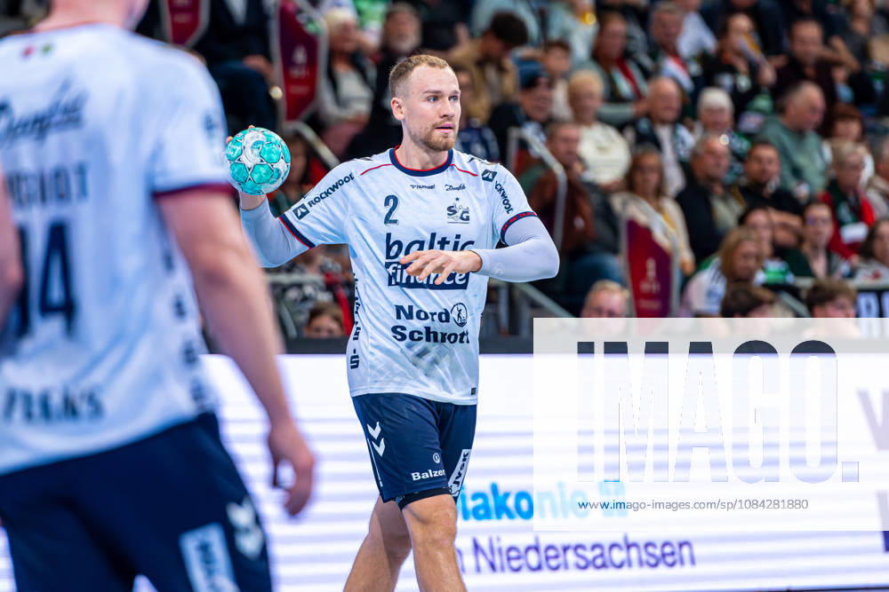 Simon Pytlick of SG Flensburg Handewitt, No. 2 from the left, TSV Hannover Burgdorf (green) vs. SG Flensburg Handewitt (blue) on Matchday 8 of the 2026–2027 season in the Opel Handball Bundesliga on October 9, 2026, ZAG Arena Hannover, GER,
