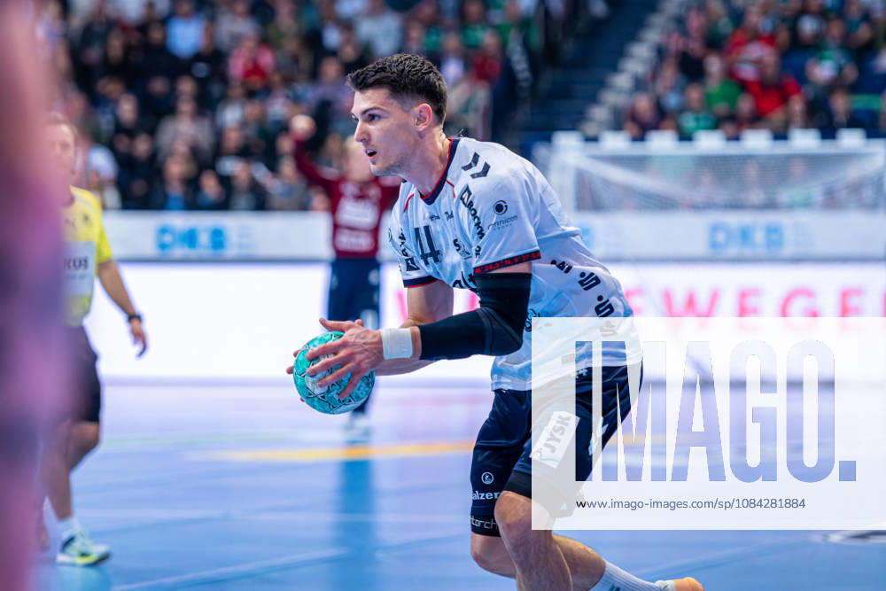 Aymeric Minne of SG Flensburg Handewitt, No. 44 (left), TSV Hannover Burgdorf (green) vs. SG Flensburg Handewitt (blue) on Matchday 8 of the 2026–2027 season in the Opel Handball Bundesliga on October 9, 2026, ZAG Arena Hannover, GER,
