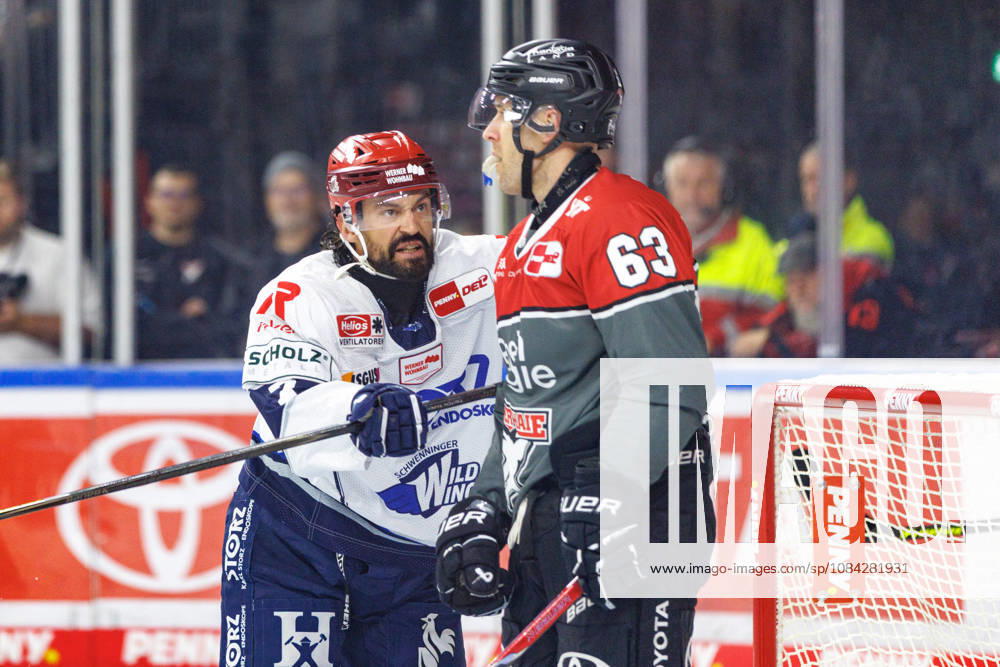 COLONGE, GERMANY - 9 OCTOBER 2026: Image shows Bittner Dominik (Schwenninger Wild Wings, 7) and Russell Patrick (Kölner Haie, 63) during PENNY DEL 2026 27 Regular Season, Matchday 7: Kölner Haie vs Schwenninger Wild Wings at LANXESS arena on 9 10 2026 in Colonge, Germany. Germany