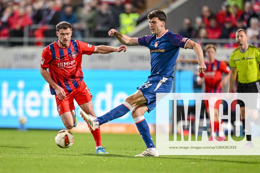 Budu Siwsiwadse of 1 FC Heidenheim 1846 and Jacob Rasmussen of 1 FC Kaiserslautern go head-to-head during the 2. Bundesliga match between 1 FC Heidenheim and 1 FC Kaiserslautern, at the Voith Arena on October 9, 2026, in Heidenheim an der Brenz, Germany. Photo by Harry Langer, DeFodi Images. Budu Siwsiwadse of 1 FC Heidenheim 1846 and Jacob Rasmussen of 1 FC Kaiserslautern battle for the ball during the 2nd Bundesliga match between 1 FC Heidenheim and 1 FC Kaiserslautern at Voith Arena on October 9, 2026, in Heidenheim an der Brenz, Germany Photo by Harry Langer DeFodi Images DFB and DFL regulations prohibit any use of photographs as image sequences and or quasi-video Photo by Harry Langer DeFodi Images DFB and DFL regulations prohibit any use of photographs as imSEQUENCES AND OR QUASI-VIDEO