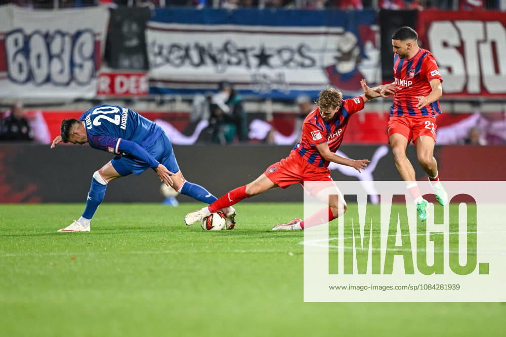 Mergim Berisha 1 FC Kaiserslautern, Jan Schoeppner of 1 FC Heidenheim 1846 and Oualid Mhamdi of 1 FC Heidenheim 1846 in a tackle during the 2. Bundesliga match between 1 FC Heidenheim and 1 FC Kaiserslautern, at the Voith Arena on October 9, 2026, in Heidenheim an der Brenz, Germany. Photo by Harry Langer, DeFodi Images. Mergim Berisha of 1 FC Kaiserslautern, Jan Schoeppner of 1 FC Heidenheim 1846 and Oualid Mhamdi of 1 FC Heidenheim 1846 battle for the ball during the 2nd Bundesliga match between 1 FC Heidenheim and 1 FC Kaiserslautern at Voith Arena on October 9, 2026 in Heidenheim an der Brenz, Germany Photo by Harry Langer DeFodi Images DFB and DFL regulations prohibit any use of photographs as image sequences and or quasi-video Photo by Harry Langer DeFodi Images DFB and DFL regulations prohibit any use of photographs as imSEQUENCES AND OR QUASI-VIDEO