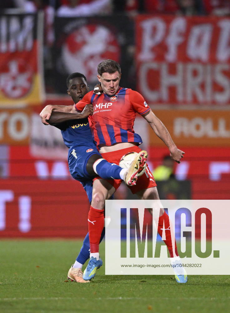 Tackle, Budu Zivzivadze Siwsiwadse of 1 FC Heidenheim 1846 (FCH) 11 vs. Maxwell Gyamfi of 1 FC Kaiserslautern (FCK) 04 1 FC Heidenheim 1846 (FCH) vs. 1 FC Kaiserslautern 09 10 2026 DFL regulations prohibit any use of photographs as image sequences and or quasi-video. 1 FC Heidenheim 1846 FCH vs. 1 FC Kaiserslautern