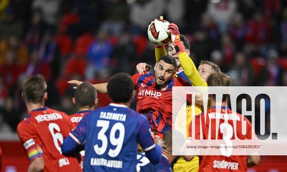 Penalty area play, Goalmouth action: Goalkeeper Thomas Daehne, 1 FC Heidenheim 1846 (FCH) 33 Oualid Mhamdi, 1 FC Heidenheim 1846 (FCH) 22 Thierry Tazemeta, 1 FC Kaiserslautern (FCK) 39 Jan Schoeppner, 1 FC Heidenheimheim 1846 FCH 03 Patrick Mainka 1 FC Heidenheim 1846 FCH 06 1 FC Heidenheim 1846 FCH vs. 1 FC Kaiserslautern 09 10 2026 DFL REGULATIONS PROHIBIT ANY USE OF PHOTOGRAPHS AS IMAGE SEQUENCES AND OR QUASI-VIDEO 1 FC Heidenheim 1846 FCH vs. 1 FC Kaiserslautern