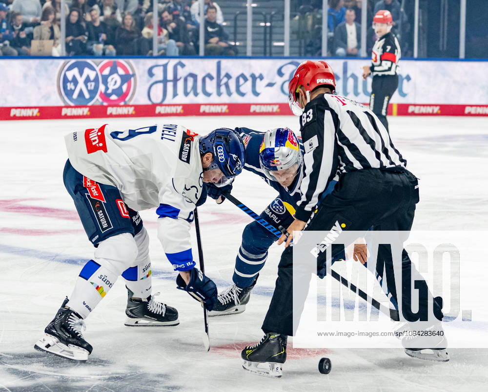 Linesman David Tschirner officiates a faceoff between Myles Powell of ERC Ingolstadt, No. 09, and Dominik Kahun of EHC Red Bull Munich, No. 21, GER, EHC Red Bull Munich vs. ERC Ingolstadt, DEL, 2026–2027 season, Matchday 7, October 9, 2026. Photo: HMB Media, Franz Feiner