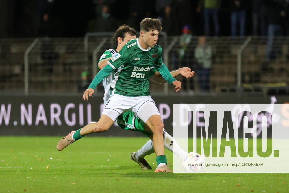 Soccer, Men s, Bavarian Regional League, 2026–2027 Season, Matchday 13: FC Schweinfurt 05 vs. SC Eltersdorf. From left: Patrick Ort (SC Eltersdorf), 14, against Lauris Bausenwein (FC Schweinfurt 05), 21. Schweinfurt, Riedel Bau Arena at Sachs Stadio, Bavaria, Lower Franconia, Germany