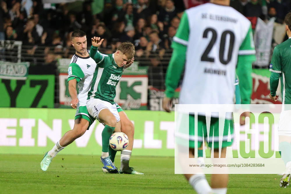 Soccer, Men s, Bavarian Regional League, 2026–2027 Season, Matchday 13: FC Schweinfurt 05 vs. SC Eltersdorf. From left: Yannik Jassmann (SC Eltersdorf, No. 09) and Gil Ebner (FC Schweinfurt 05, No. 08). Schweinfurt, Riedel Bau Arena at Sachs Stadio, Bavaria, Lower Franconia, Germany
