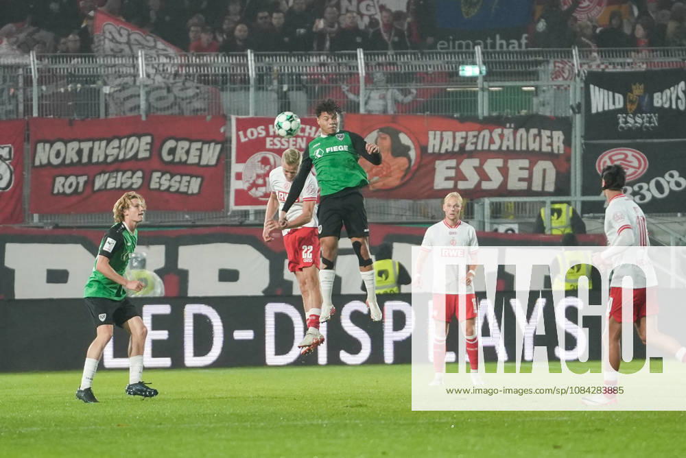 Germany 3rd Division 2026–2027, Matchday 8: SC Preußen Münster vs. Rot-Weiß Essen, Friday, October 9, 2026, LVM Preußenstadion, Münster, North Rhine-Westphalia, Germany; Heading duel: Montell Ndikom (SC Preußen Münster), 28, vs. Janne Sietan (RW Essen), 22