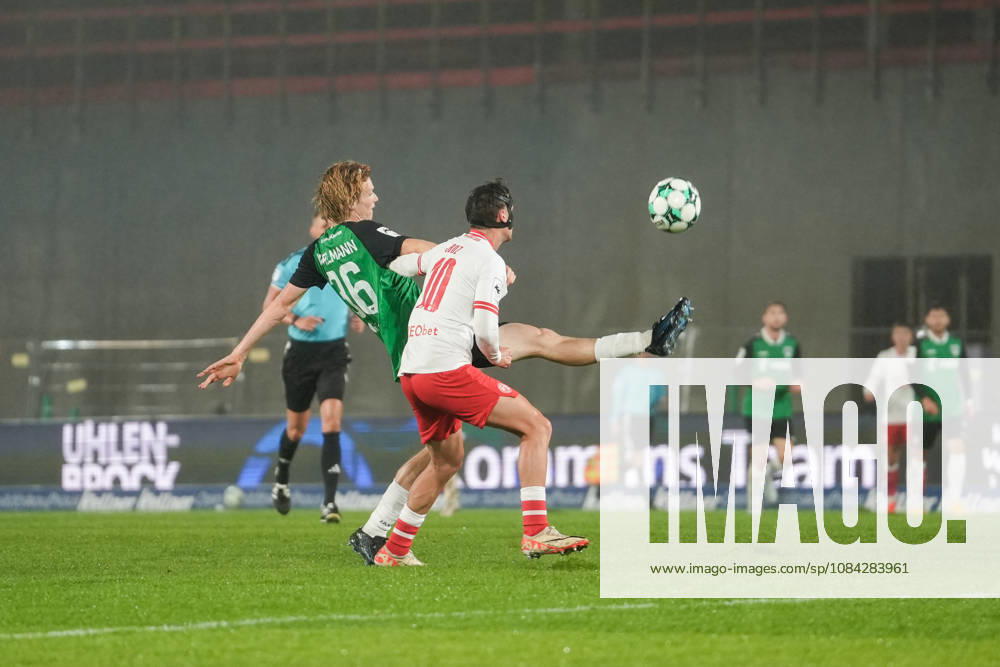 Germany 3rd Division 2026–2027, Matchday 8: SC Preußen Münster vs. Rot-Weiß Essen, Friday, October 9, 2026, LVM Preußenstadion, Münster, North Rhine-Westphalia, Germany—Marvin Obuz (RW Essen) and Niklas Varelmann (SC Preußen Münster) in a tackle, 36