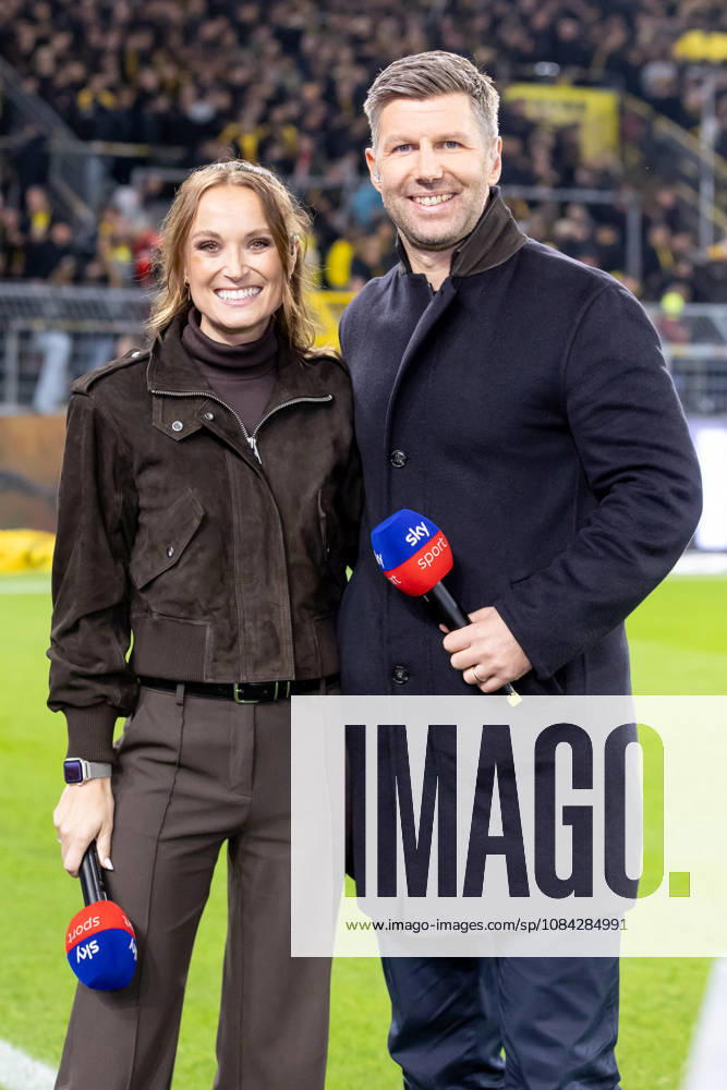 Dortmund, Germany, October 9, 2026, Bundesliga 2026–2027, Matchday 5: Borussia Dortmund vs. SV Werder Bremen. Pictured: Nele Ocik, SKY host, Thomas Hitzelsperger, SKY expert. DFL and DFB regulations prohibit any use of photographs as image sequences and or quasi-video. Signal Iduna Park, North Rhine-Westphalia