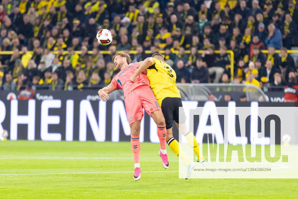 Dortmund, Germany October 9, 2026 Bundesliga 2026–2027 Matchday 5: Borussia Dortmund vs. SV Werder Bremen Pictured from left in a tackle: Niclas Füllkrug (SVW) and Waldemar Anton (BVB). DFL and DFB regulations prohibit any use of photographs as image sequences and or quasi-video at Signal Iduna Park, North Rhine-Westphalia