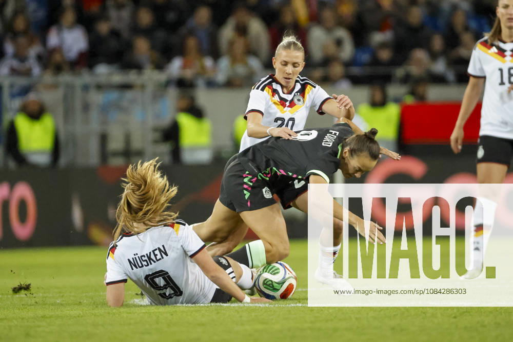 Sjoeke Nüsken, Nusken (Germany), 09, Caitlin Foord (Australia), 09, and Elisa Senß, Senss (Germany), 20, battling for the ball; Germany, soccer, women, friendly match, 2026, Germany vs. Australia, October 9, 2026, Karlsruhe BBBank Wildpark, Germany