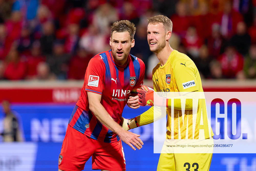 Patrick Mainka (1 FC Heidenheim, 06) and Thomas Daehne (1 FC Heidenheim, 33) high-five each other, celebrating a successful rescue mission GER, 1 FC Heidenheim 1846 vs. 1 FC Kaiserslautern, soccer, 2. Bundesliga, Matchday 7, 2026–2027 season, October 9, 2026 DFL regulations prohibit any use of photographs as image sequences and or quasi-video GER, 1 FC Heidenheim 1846 vs. 1 FC Kaiserslautern, soccer, 2. Bundesliga, Matchday 7, 2026–2027 season, October 9, 2026, Heidenheim an der Brenz