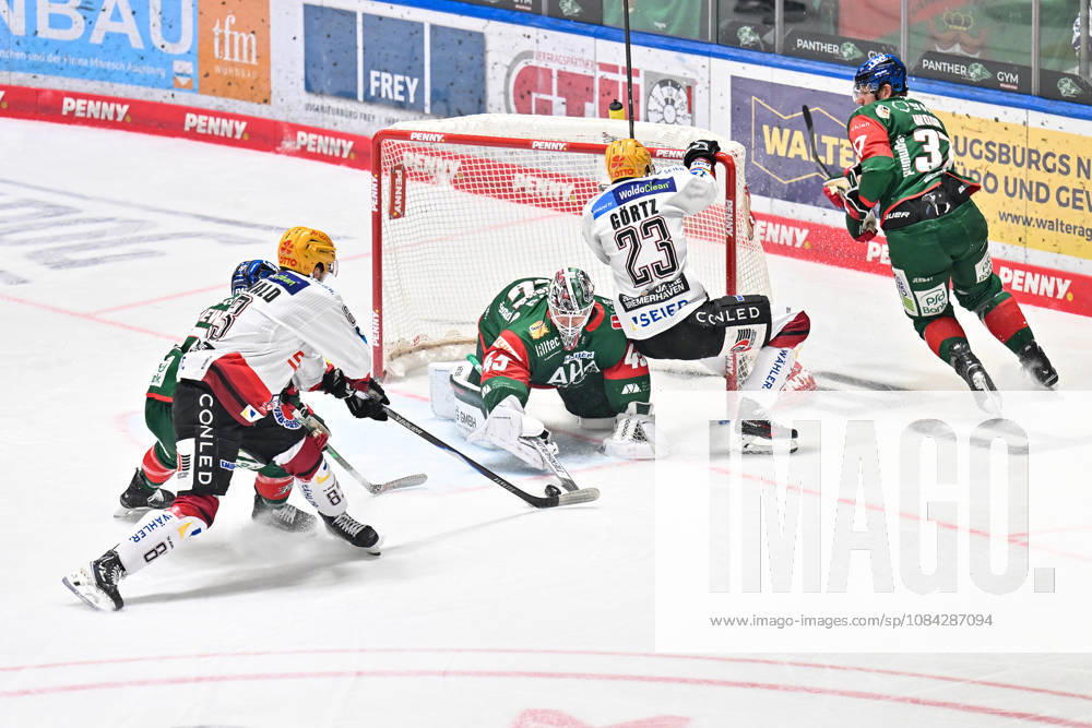 Penny DEL: Augsburger Panther vs. Fischtown Pinguins, October 9, 2026, AUGSBURG, GERMANY, October 9. Pictured: Max GÖRTZ of the Fischtown Pinguins (No. 23) scores a goal against Tobias ANCICKA of the Augsburger Panther (No. 45) during the Penny DEL match between the Augsburger Panther and the Fischtown Pinguins on Matchday 7 at the Curt Frenzel Stadium