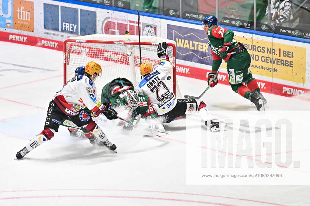 Penny DEL: Augsburger Panther vs. Fischtown Pinguins, October 9, 2026, AUGSBURG, GERMANY, October 9. Pictured: Max GÖRTZ of the Fischtown Pinguins (No. 23) scores a goal against Tobias ANCICKA of the Augsburger Panther (No. 45) during the Penny DEL match between the Augsburger Panther and the Fischtown Pinguins on Matchday 7 at the Curt Frenzel Stadium