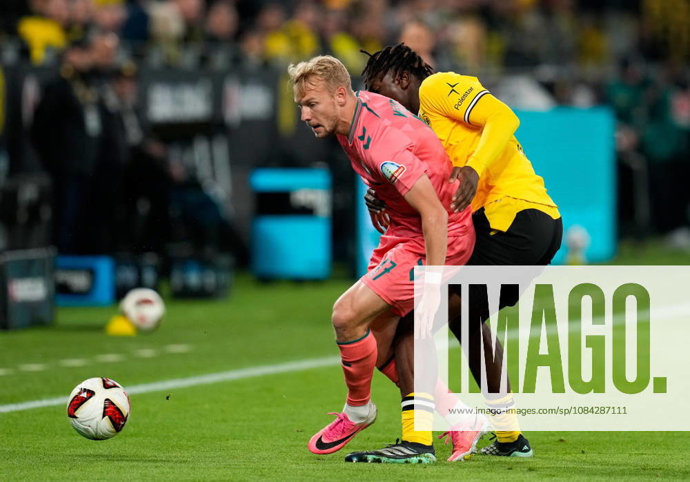 Marco Gruell (SV Werder Bremen, 17) in a tackle with Joane Gadou (Borussia Dortmund, 22) GER, Borussia Dortmund vs. SV Werder Bremen, Bundesliga 1, Matchday 5, 2026–27 season, SIGNAL IDUNA PARK, Dortmund, October 9, 2026 DFL regulations prohibit any use of photographs as image sequences and or quasi-video Borussia Dortmund vs. SV Werder Bremen, Bundesliga 1, Matchday 5, 2026–27 season, October 9, 2026, Dortmund