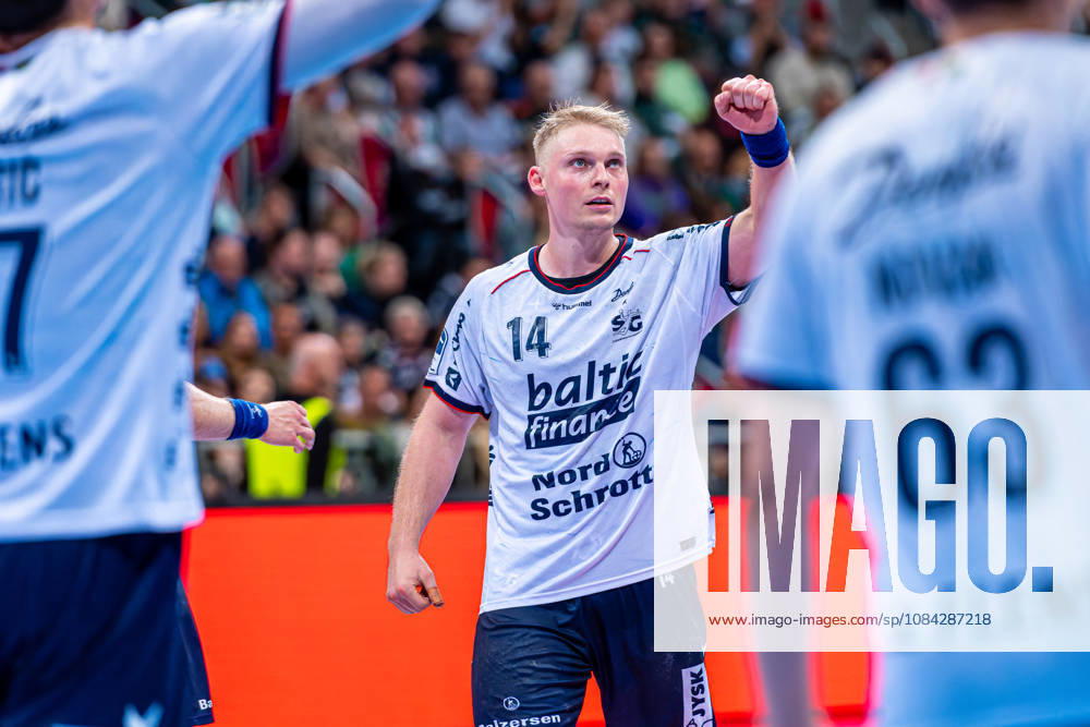 Emil Bergholt of SG Flensburg Handewitt, No. 14 from the left, TSV Hannover Burgdorf (in green) vs. SG Flensburg Handewitt (in blue) on Matchday 8 of the 2026–2027 season in the Opel Handball Bundesliga on October 9, 2026, ZAG Arena Hannover, GER,