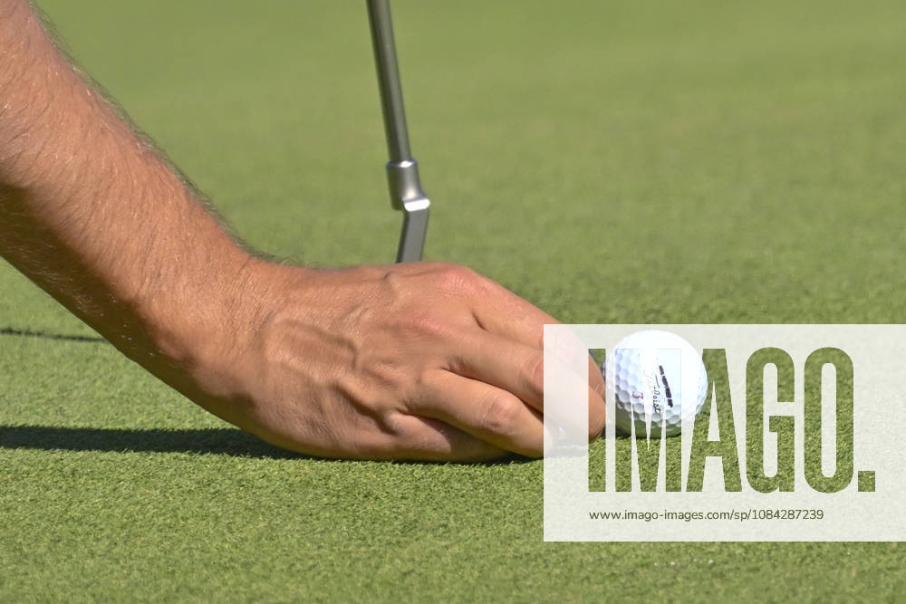Close-up of a playerÃ¢â‚¬â ¢s hand placing the ball on the mark during the Open de EspaoÂ±a presented by Madrid at Club de Campo Villa de Madrid on October 09, 2026 in Madrid, Spain. Open GOLF De Spain Presented By Madrid - 10.09.26 (Second Day) - ZUMAc312 20261009_zsp_c312_428