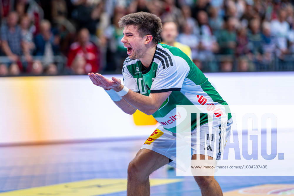 Renars Uscins of TSV Hannover Burgdorf, No. 10 from the left, TSV Hannover Burgdorf (green) vs. SG Flensburg Handewitt (blue) on Matchday 8 of the 2026–2027 season in the Opel Handball Bundesliga on October 9, 2026, ZAG Arena Hannover, GER,
