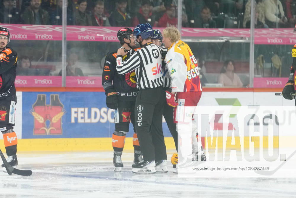 3014 Bern BE, Switzerland - October 09: Marc Marchon (8 SCB) fights against Marcus Sylvegard (PostFinance Top Scorer of EHCB) during the National League match between SC Bern and EHC Biel-Bienne at PostFinance Arena on October 09, 2026 in 3014 Bern BE, Switzerland.
