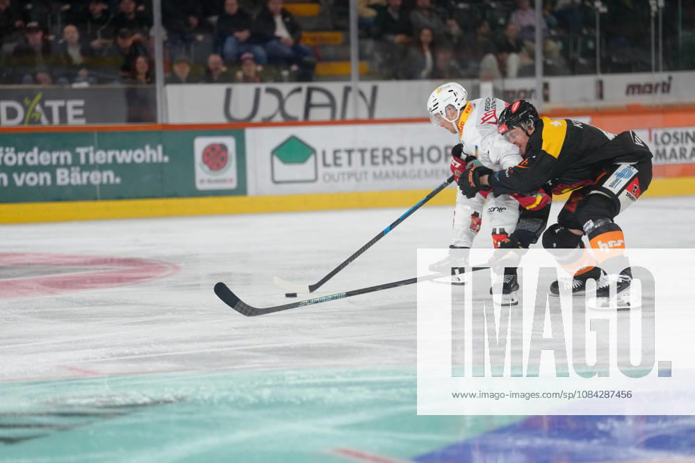 3014 Bern BE, Switzerland - October 09: Simon Kindschi (41 SCB) in duel with Jeff Skinner (53 EHCB) during the National League match between SC Bern and EHC Biel-Bienne at PostFinance Arena on October 09, 2026 in 3014 Bern BE, Switzerland.