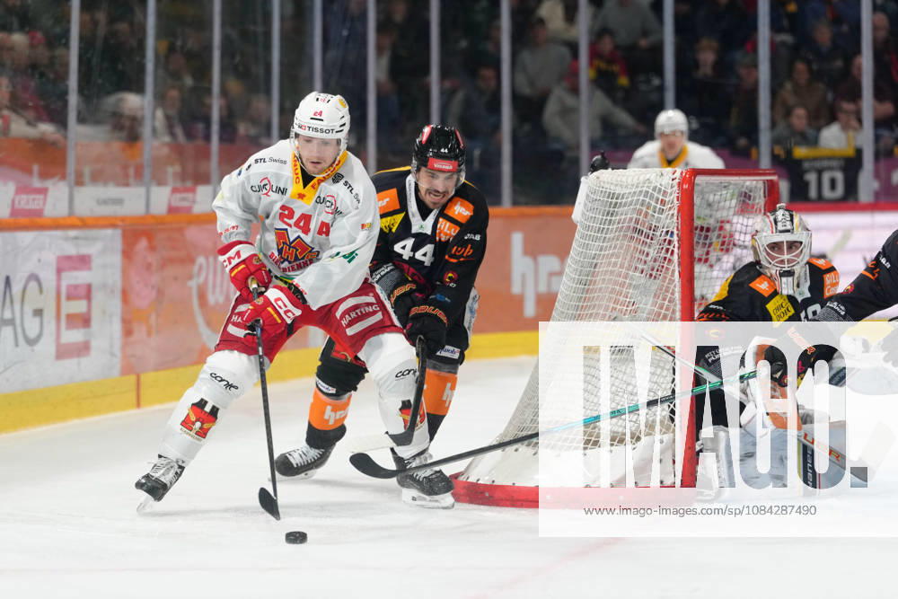 3014 Bern BE, Switzerland - October 09: Lias Andersson (24 EHCB) in duel with Samuel Kreis (44 SCB) during the National League match between SC Bern and EHC Biel-Bienne at PostFinance Arena on October 09, 2026 in 3014 Bern BE, Switzerland.