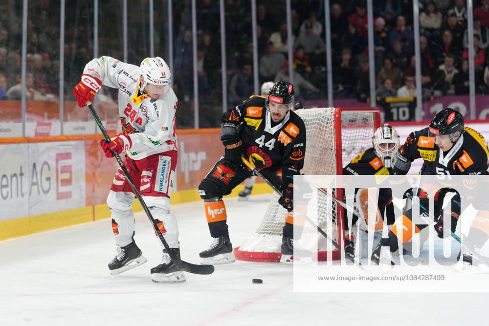3014 Bern BE, Switzerland - October 09: Lias Andersson (24 EHCB) in duel with Samuel Kreis (44 SCB) during the National League match between SC Bern and EHC Biel-Bienne at PostFinance Arena on October 09, 2026 in 3014 Bern BE, Switzerland.