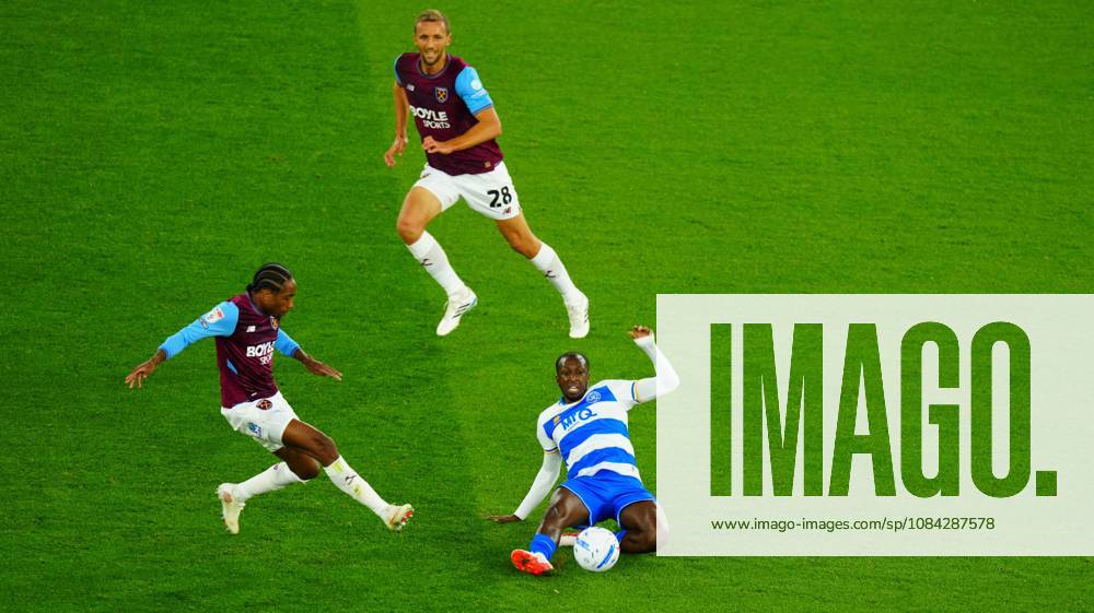 Glen Kamara of QPR wins the ball ahead of Kyle Walker-Peters of West Ham United West Ham United v Queens Park Rangers, EFL Championship, Football, London Stadium, London, UK - 09 Oct 2026London London Stadium United Kingdom